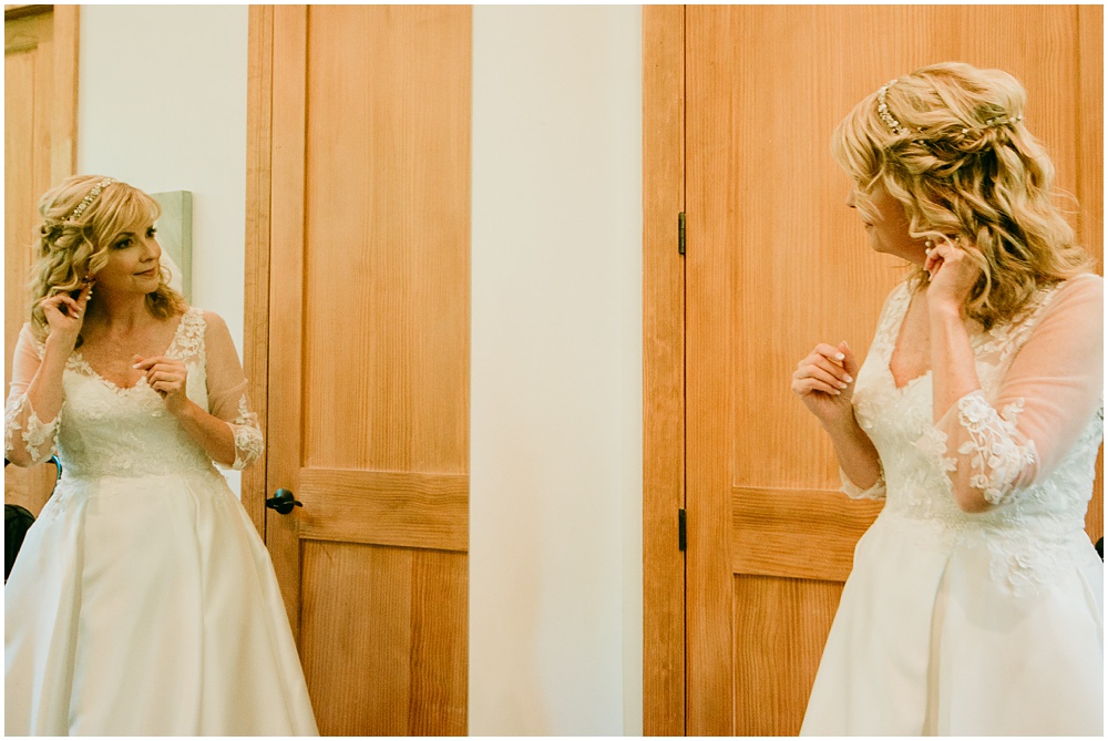 flowery branch wedding photographer takes pictures of the bride getting ready at Juliette Chapel, a wedding venue in Dahlonega, Ga, hidden wooded wedding venue 