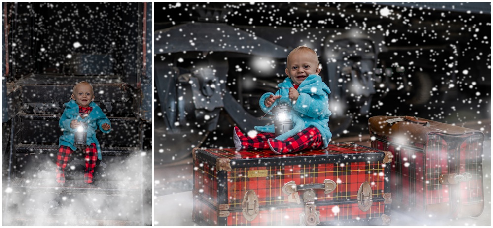 toddler in Christmas pajamas sits on luggage outside of Duluth Train Museum for Polar Express Minis. 