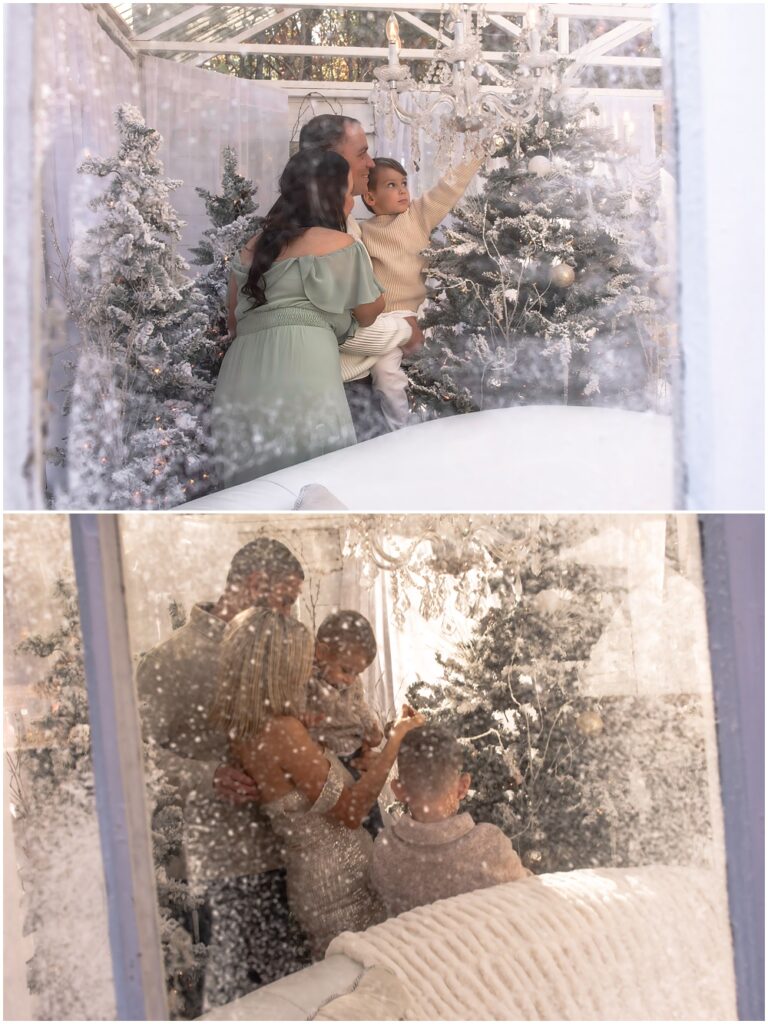 peeking through the window watching these families decorate the Christmas tree during their enchanted greenhouse session at Mayberry Acres in Canton, Ga