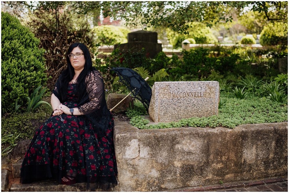 Bride posing during an engagement session at Oakland Cemetery in Atlanta georgia. Goth bride 2025