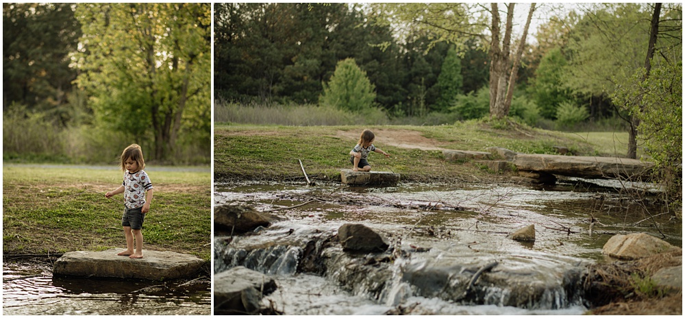 little boy playing on a rock near a creek during his mommy and me session at Gerrard landing park 